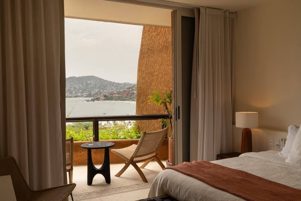 Bedroom with private balcony and Zihuatanejo Bay view