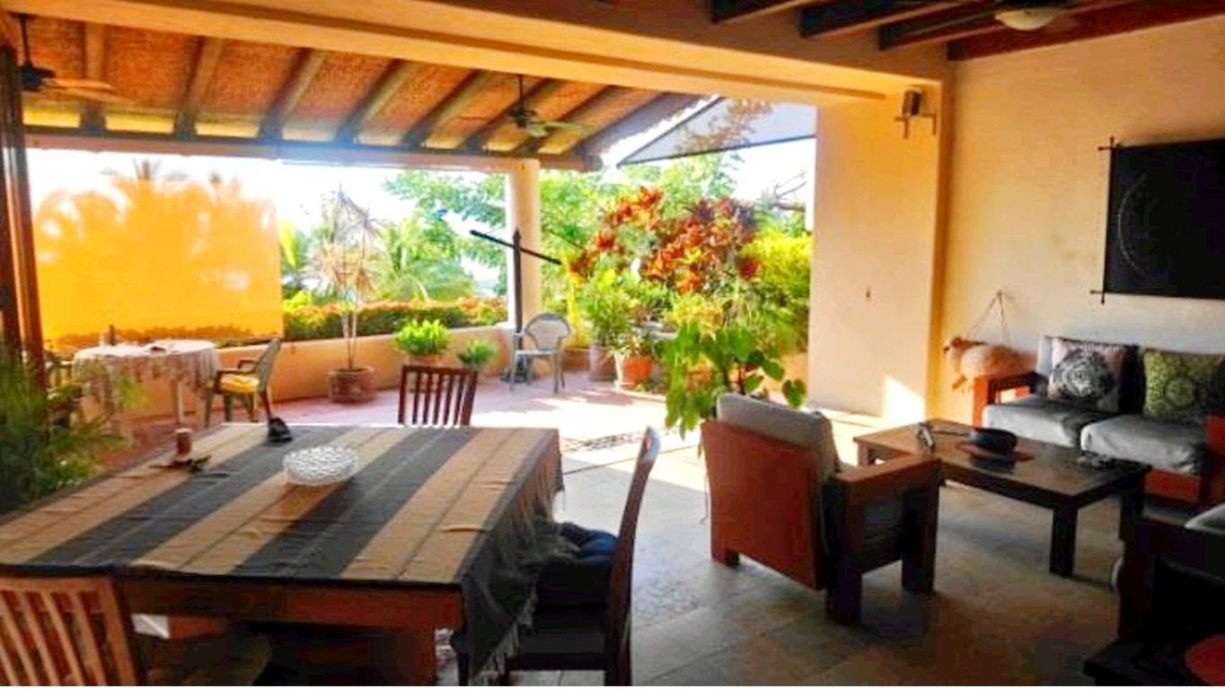 Sala y comedor abiertos a la terraza