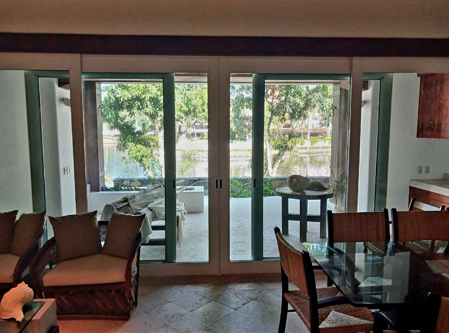 Elegant living and dining room overlooking the marina