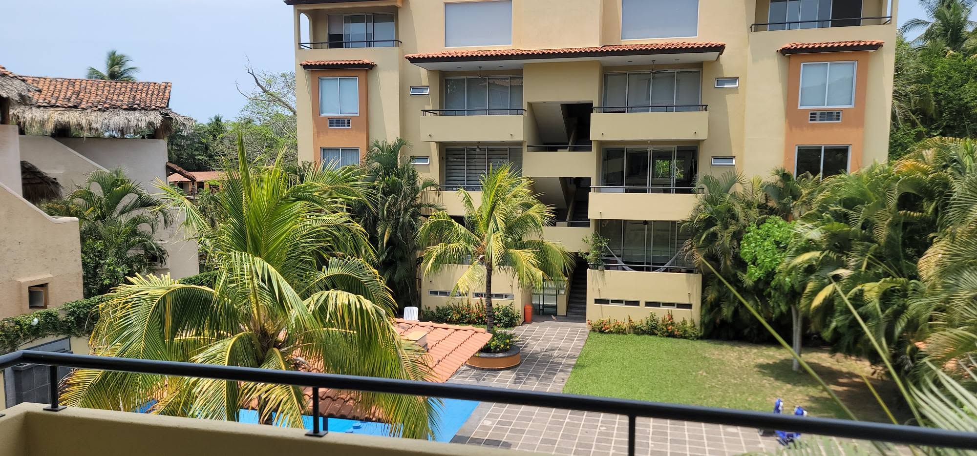 Garden and pool view from condominium