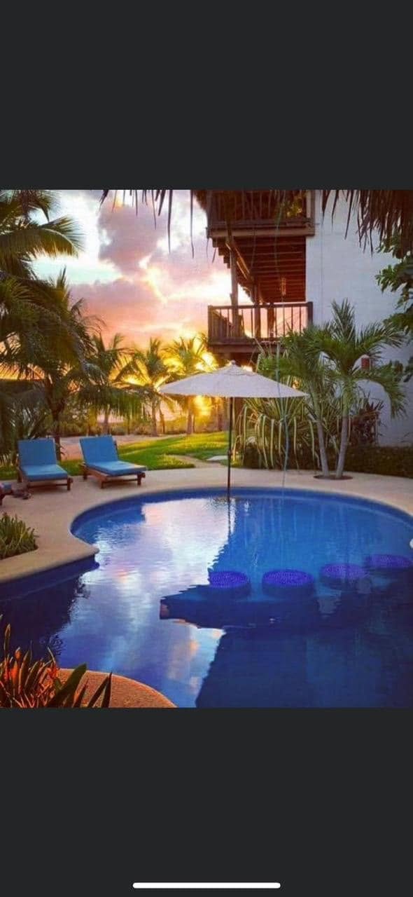 Sunset by the hotel pool