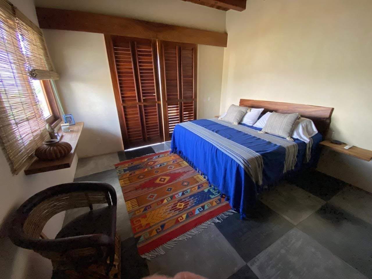 King bedroom with Parota wood details