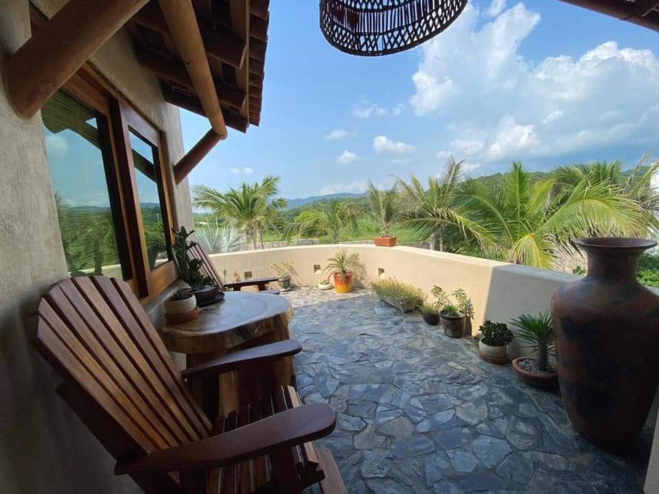 Stone terrace with tropical views