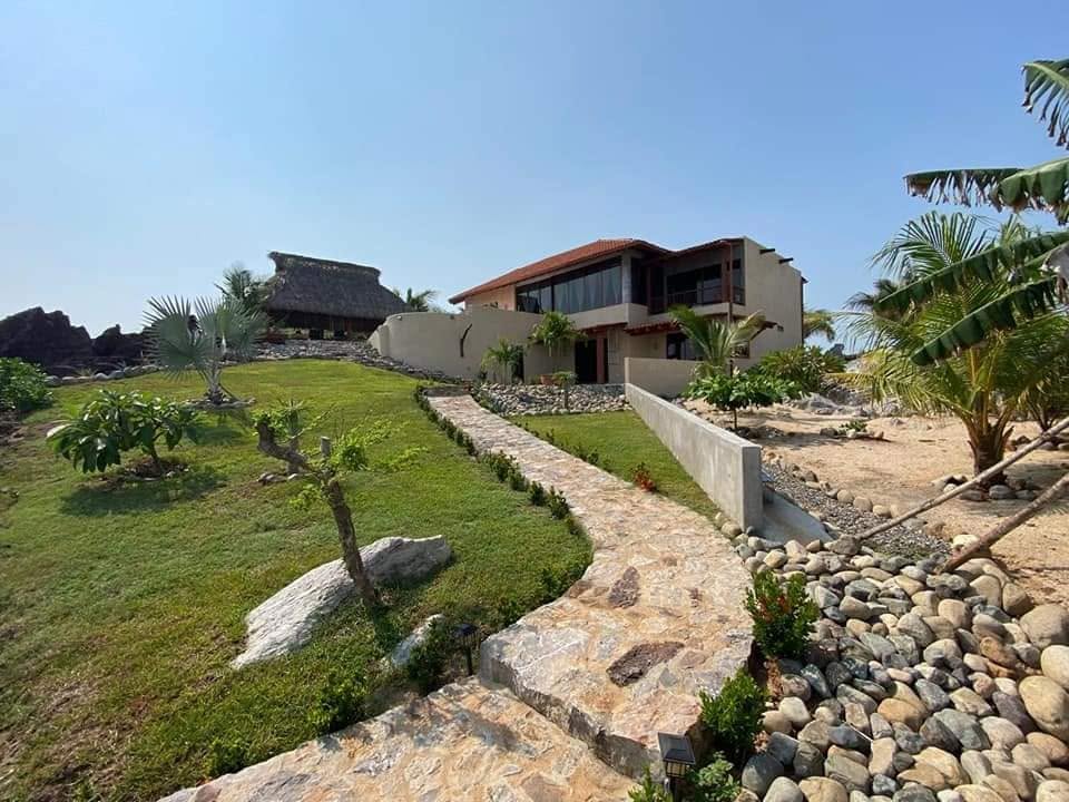 Residence, gardens and stone walkway